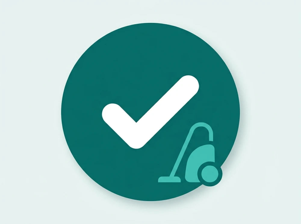 Checkmark badge icon with a vacuum cleaner silhouette representing vacuum filter compatibility confirmation